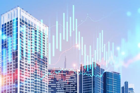 Épületek, mögötte a burj Kalifa, előtte grafikonok.